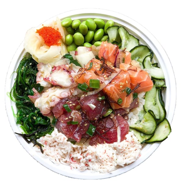 A vibrant GoPoke bowl filled with tuna, salmon, octopus, crab, seaweed, edamame, and cucumber.